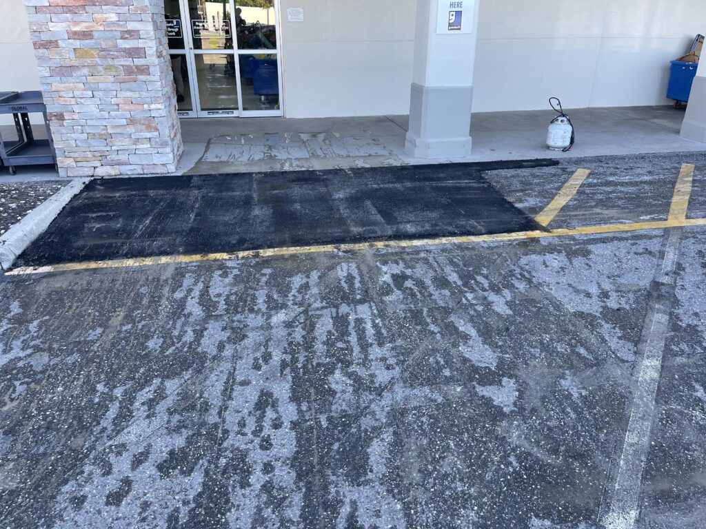 Newly repaired asphalt pavement