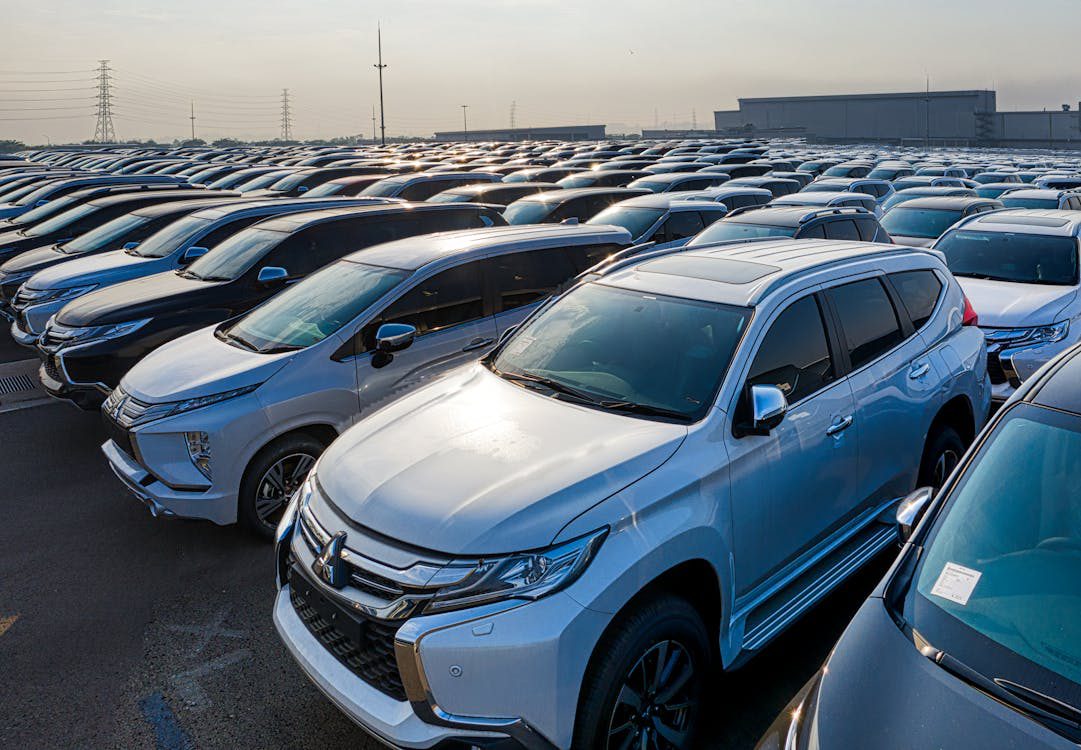 expensive new sparkling automobiles of manufacture