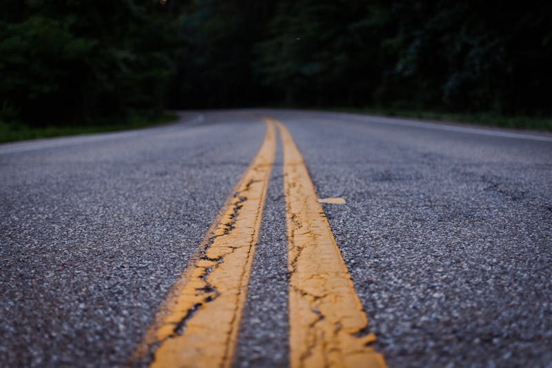 A cracked asphalt road.