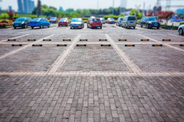 Parking lot in North Port with wheel stops installed to prevent property accidents