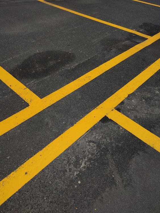 yellow lanes on a pavement.