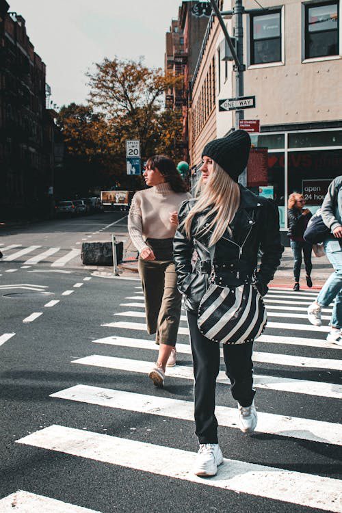 people walking on pedestrian lane