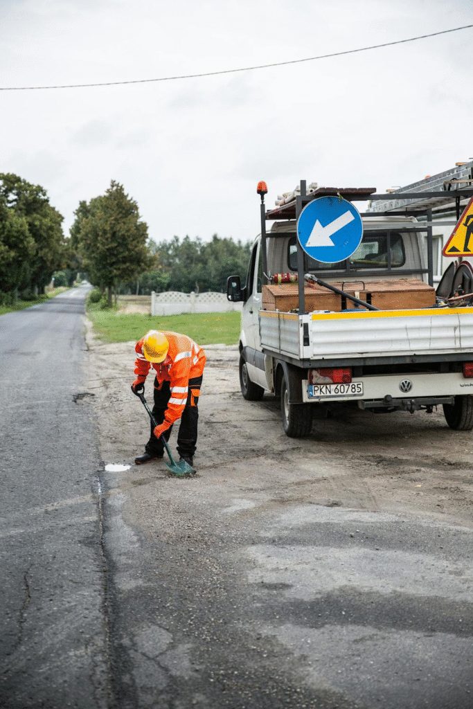 A worker on a road.