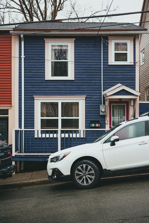 Cars parked outside a house