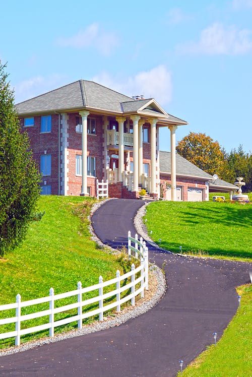 Asphalt driveway outside a house