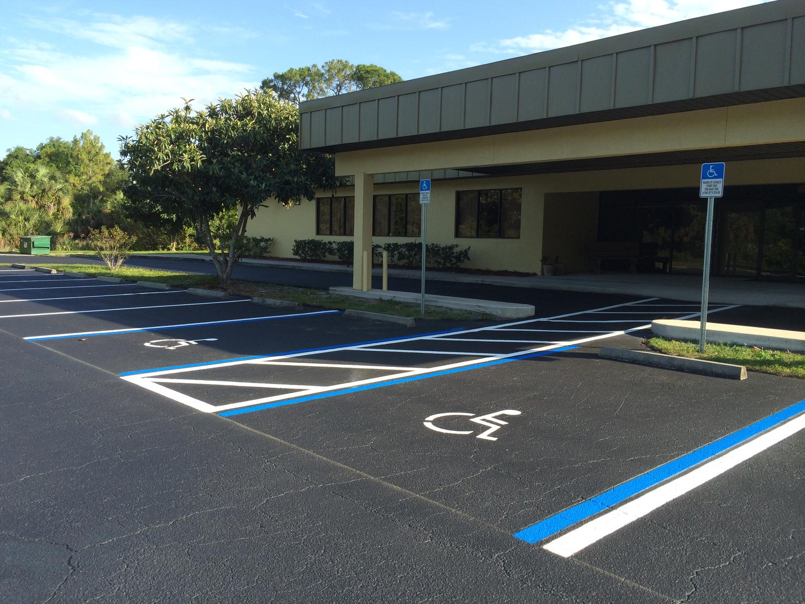 Restriped accessible parking bays outside an office
